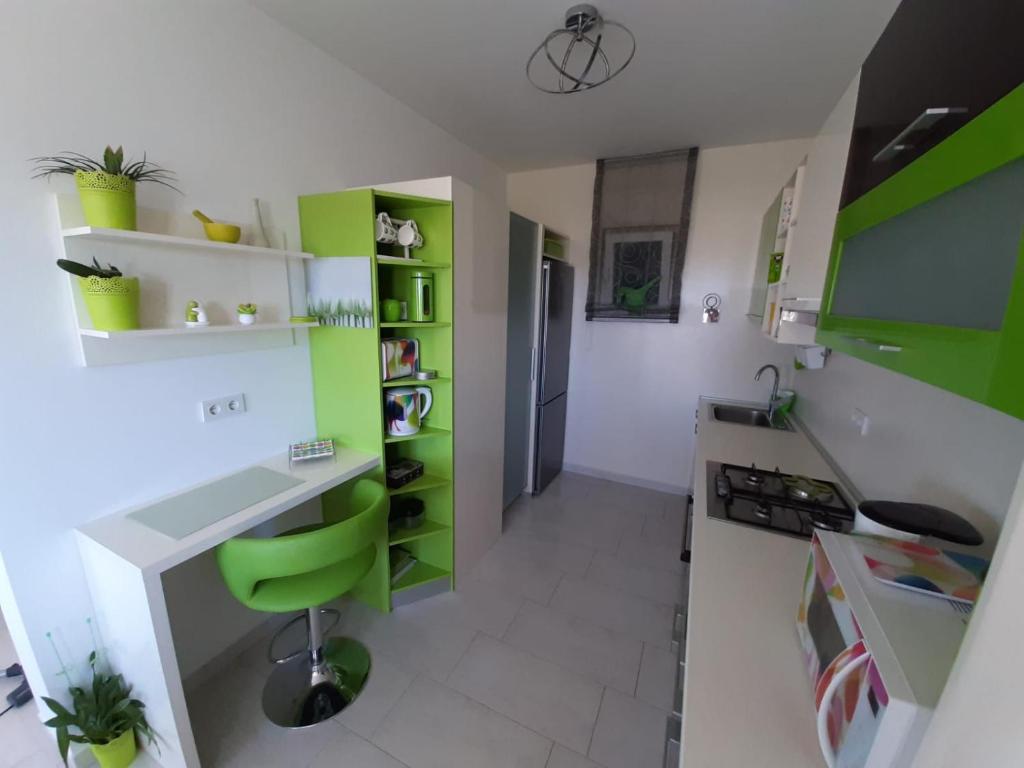 Kuchyň nebo kuchyňský kout v ubytování Apartment Mia
