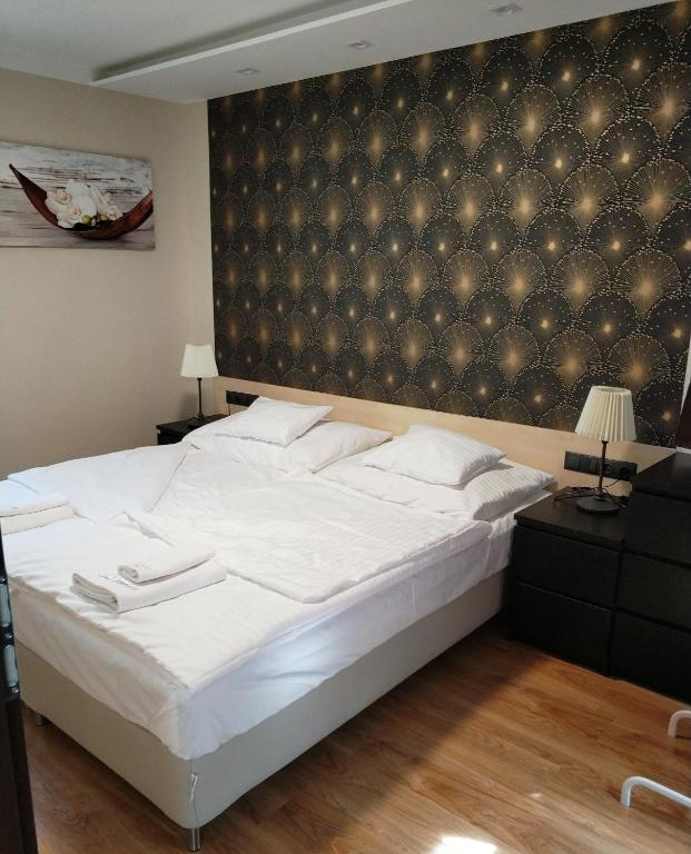 Cama o camas de una habitación en Terrasun Apartments