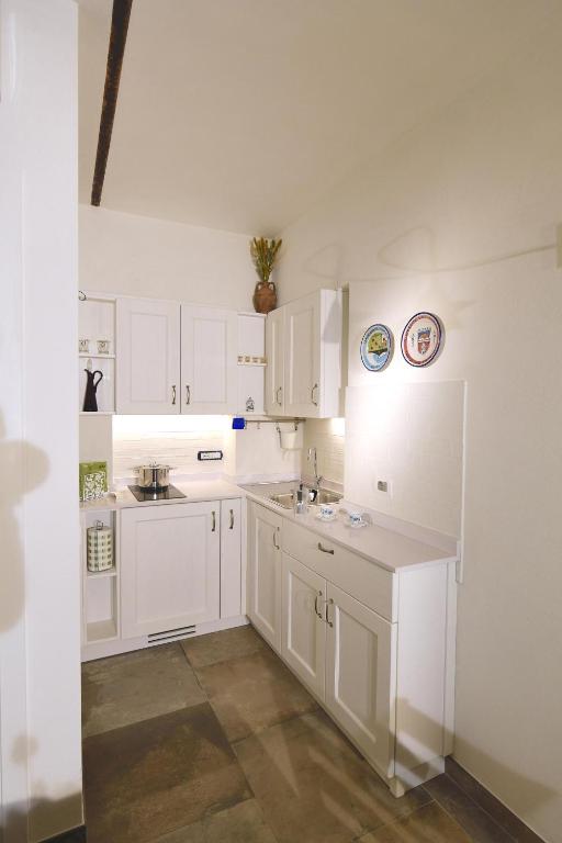 A kitchen or kitchenette at Casa delle Rocche