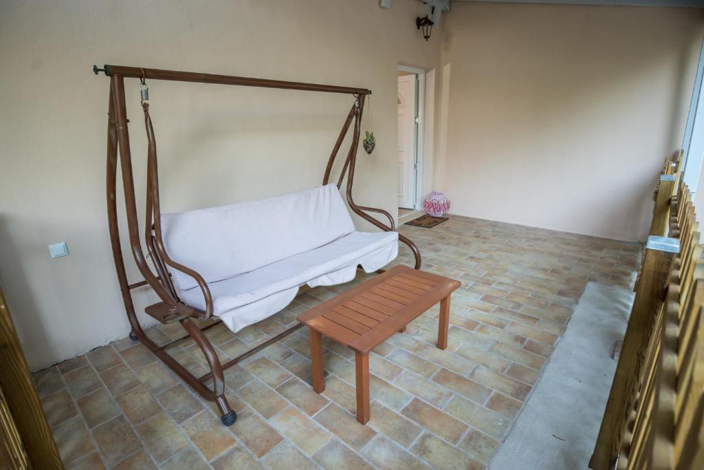 Postel nebo postele na pokoji v ubytování Camping & Rooms Kariotes