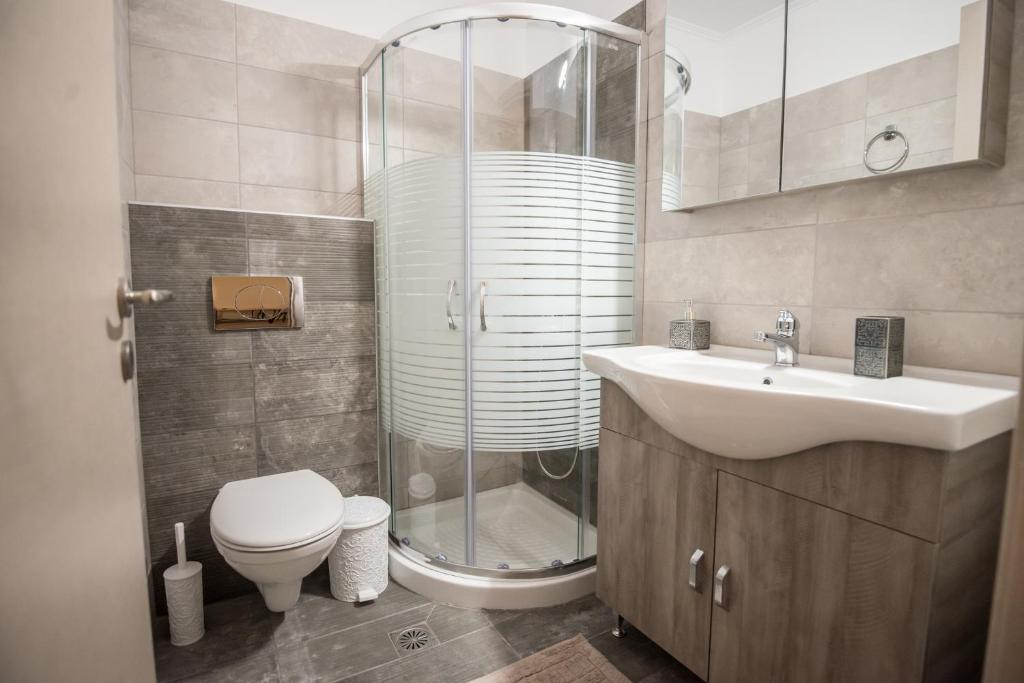 Koupelna v ubytování Camping & Rooms Kariotes