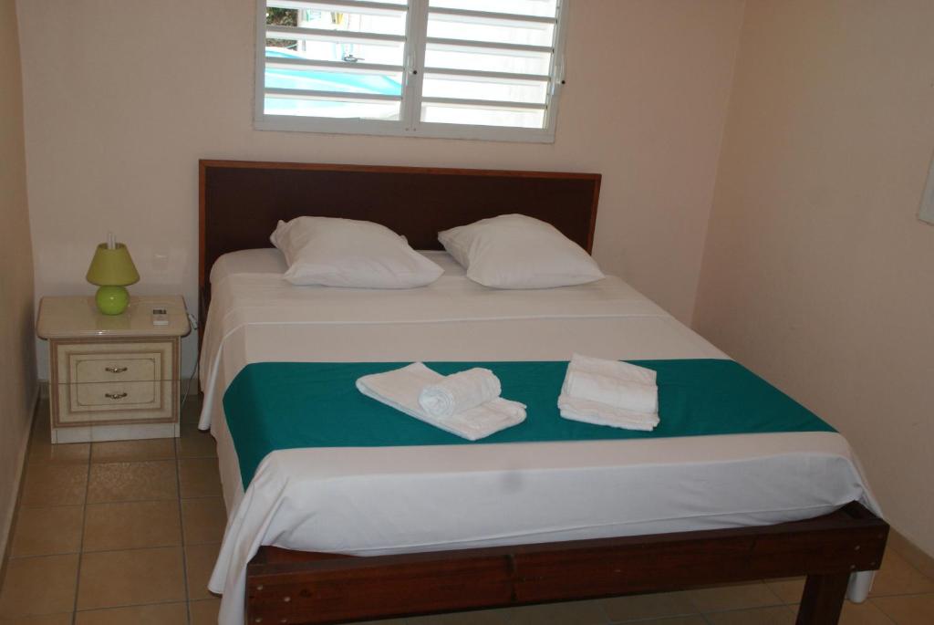 Cama o camas de una habitación en residence cattanies