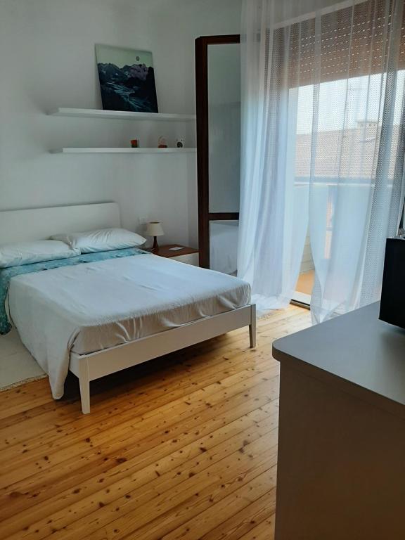 A bed or beds in a room at Alloggio il Giglio