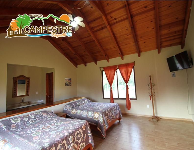 Postel nebo postele na pokoji v ubytování Posada Campestre Tasquillo