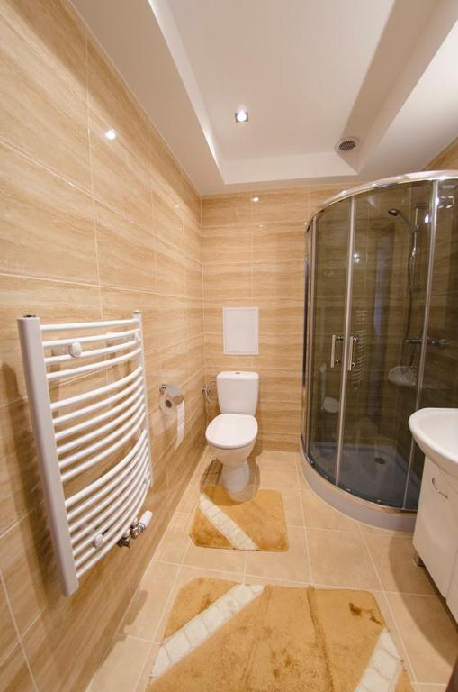 Kúpeľňa v ubytovaní Apartamenty Giżycko