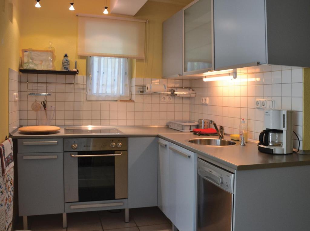 Kuchyň nebo kuchyňský kout v ubytování Anna Apartment