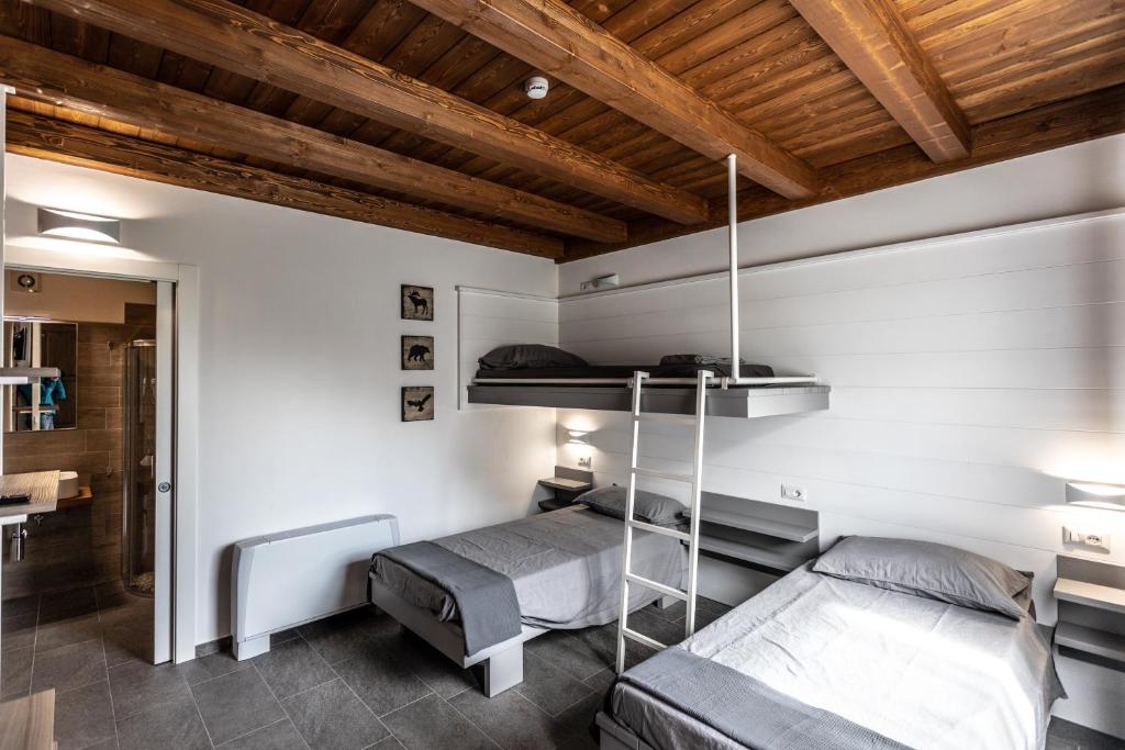 Postel nebo postele na pokoji v ubytování Miglio608
