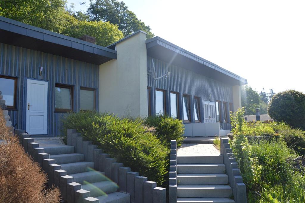 a building with stairs leading up to it at Bergpanorama Ruhla in Ruhla