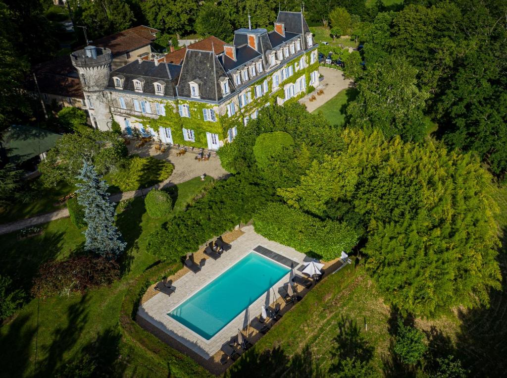 an aerial view of an estate with a swimming pool at Château de Lalande - Les Collectionneurs - Périgueux in Annesse-et-Beaulieu