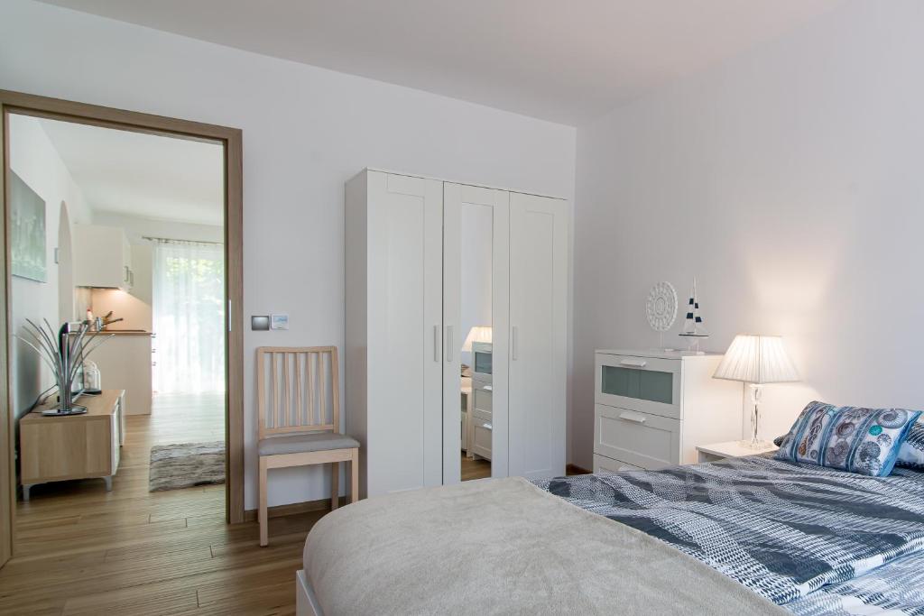 Posteľ alebo postele v izbe v ubytovaní Praia Apartments - 200m do Plaży Orłowo - Parking - Apartament Laguna