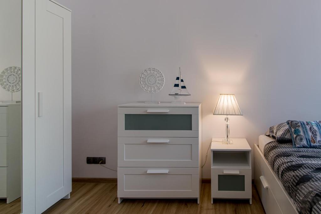 Posteľ alebo postele v izbe v ubytovaní Praia Apartments - 200m do Plaży Orłowo - Parking - Apartament Laguna