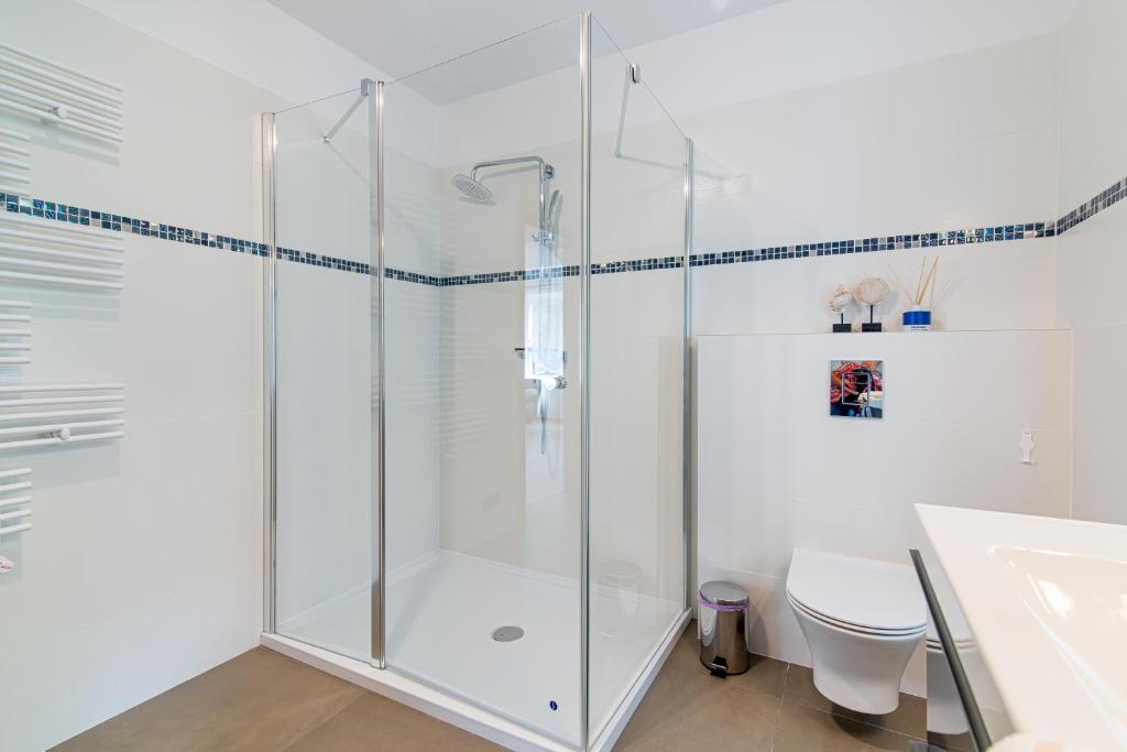 Kúpeľňa v ubytovaní Praia Apartments - 200m do Plaży Orłowo - Parking - Apartament Laguna