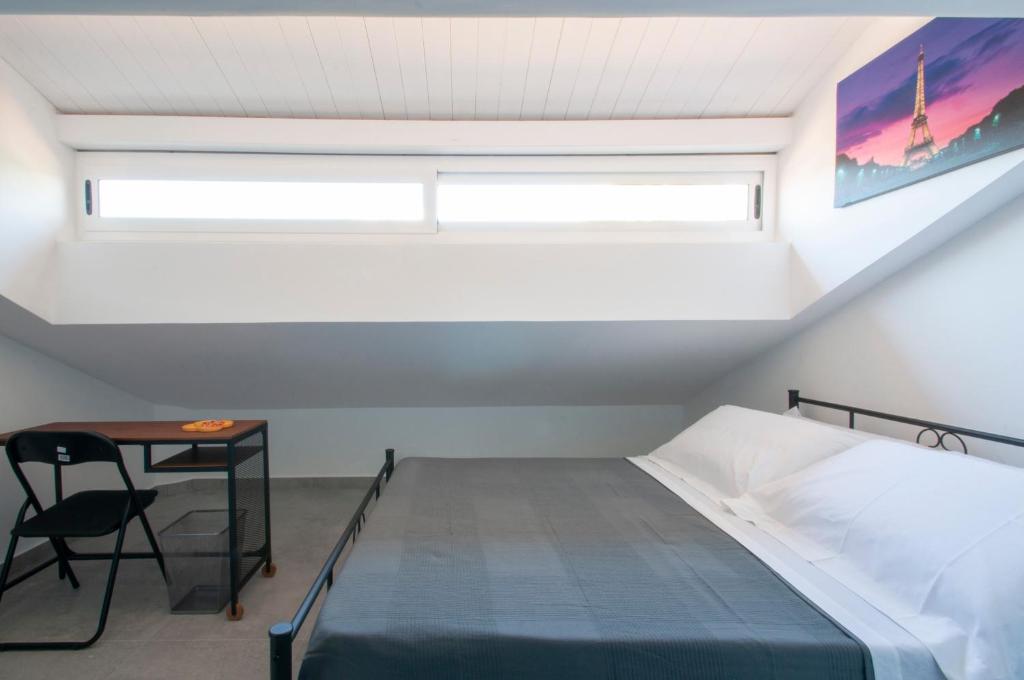 Postel nebo postele na pokoji v ubytování B&b Vittoria House