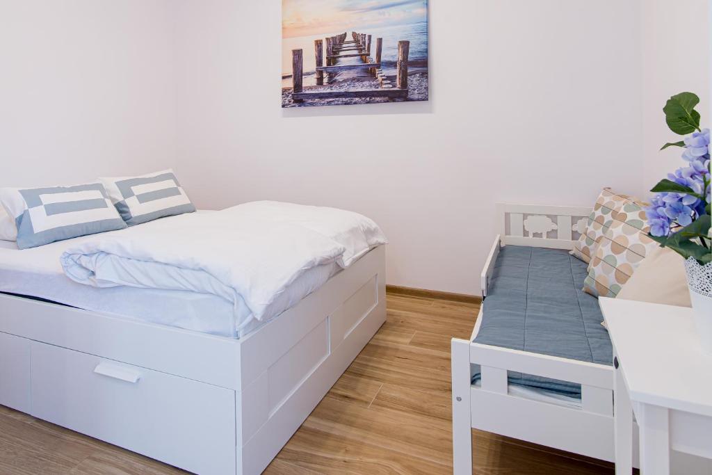 Posteľ alebo postele v izbe v ubytovaní Praia Apartments - 200m do Plaży Orłowo - Parking - Apartament Laguna