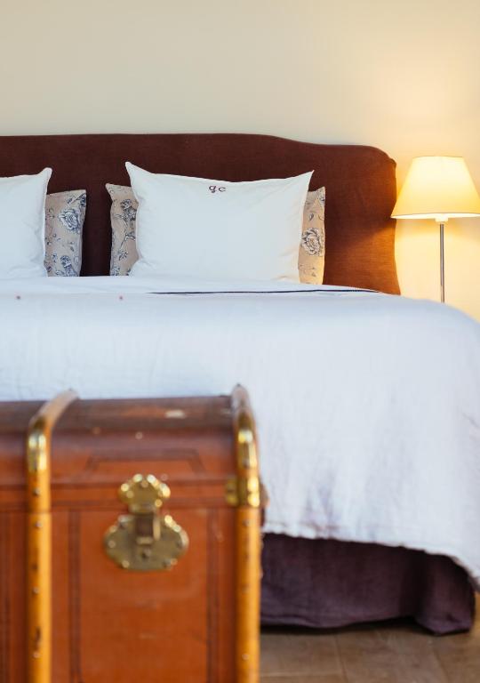 Postel nebo postele na pokoji v ubytování Guesthouse Castagnola