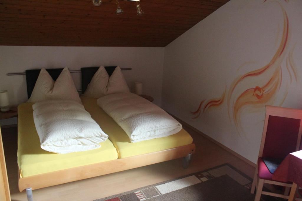 Postel nebo postele na pokoji v ubytování Café Landerl