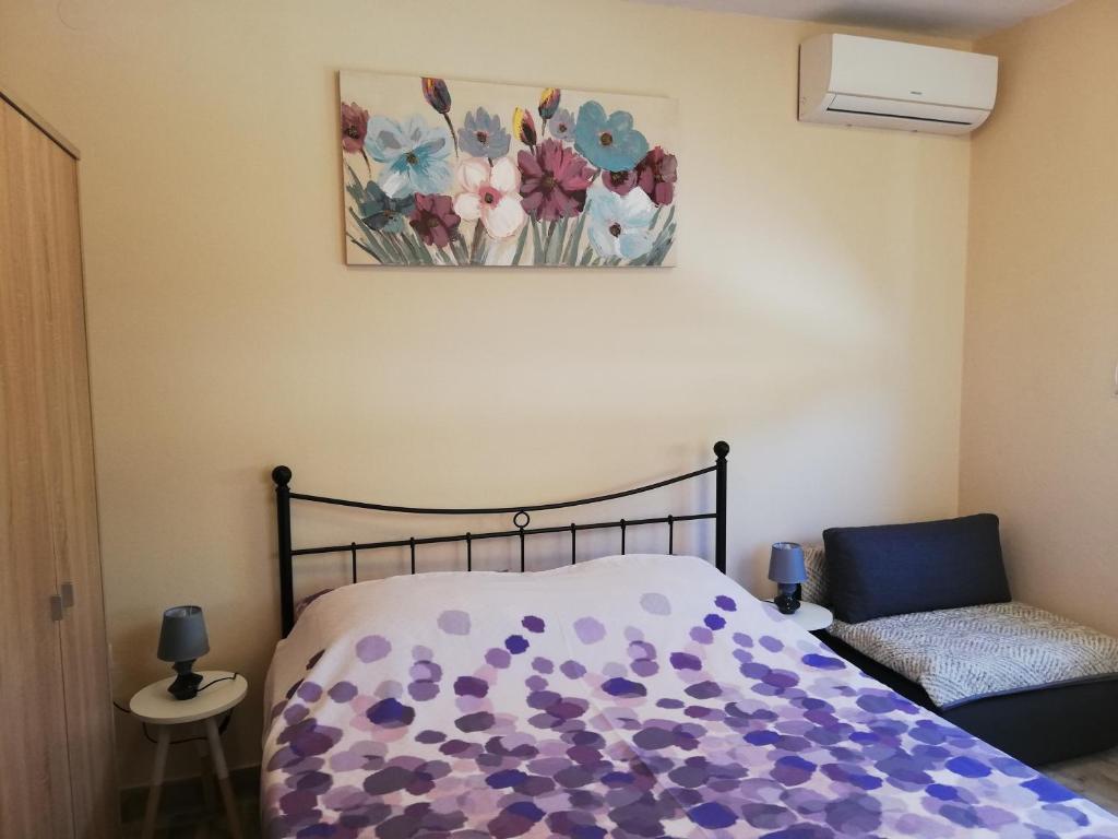 Postel nebo postele na pokoji v ubytování Studio Apartment Palmira