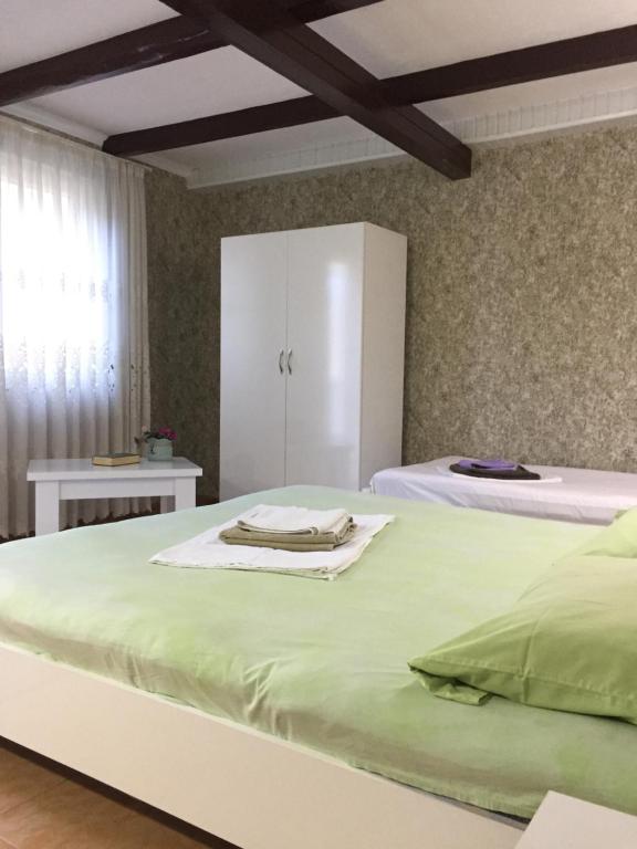 Llit o llits en una habitació de Feride