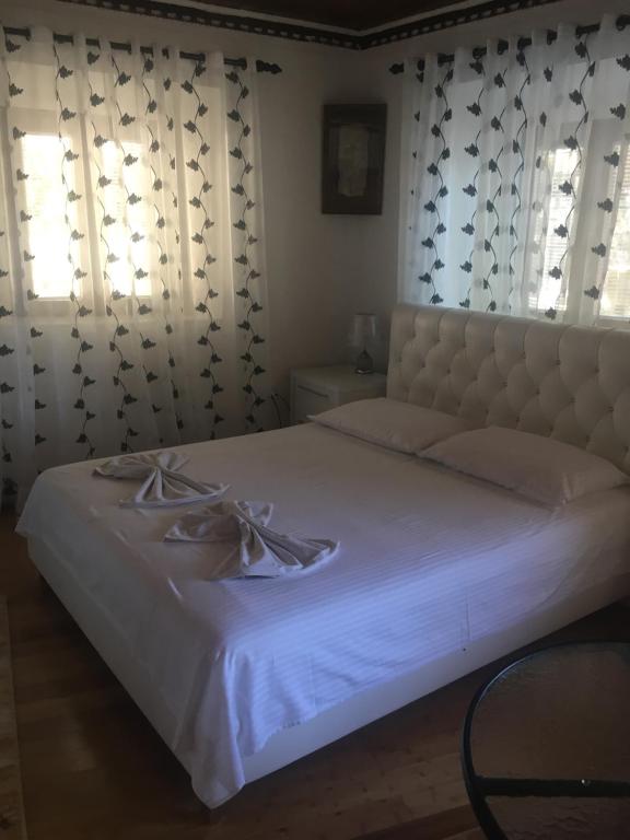 Postel nebo postele na pokoji v ubytování Guest House Alea