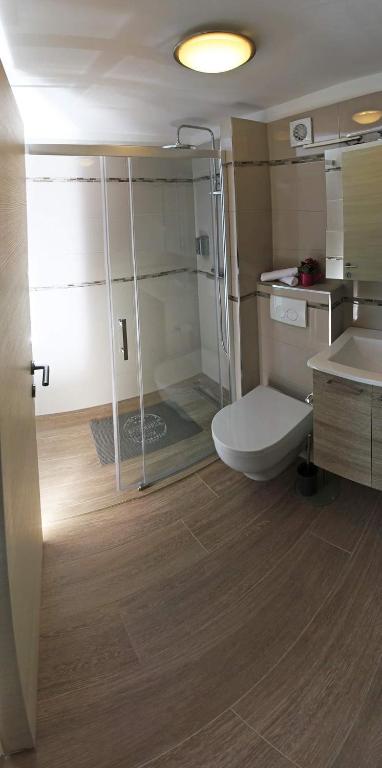 Kúpeľňa v ubytovaní Apartmani Donata