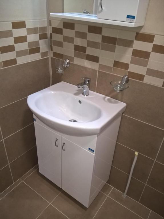 Koupelna v ubytování Apartmani Mimi