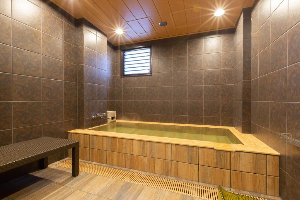 Koupelna v ubytování Hot Spring Osaka Hinode Hotel Nipponbashi