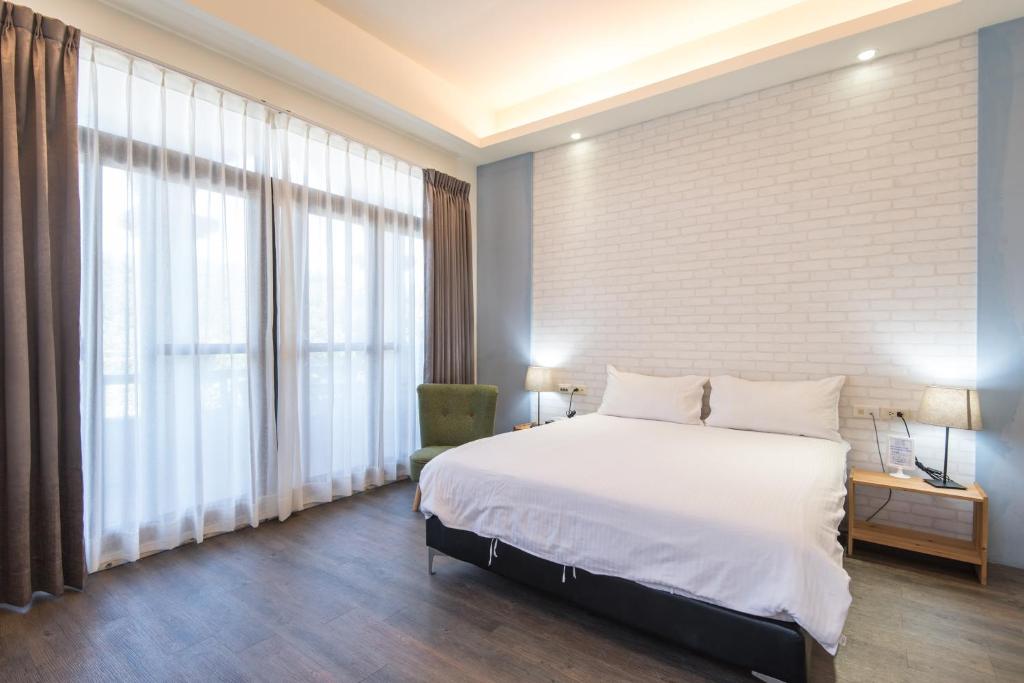 Postel nebo postele na pokoji v ubytování CT House