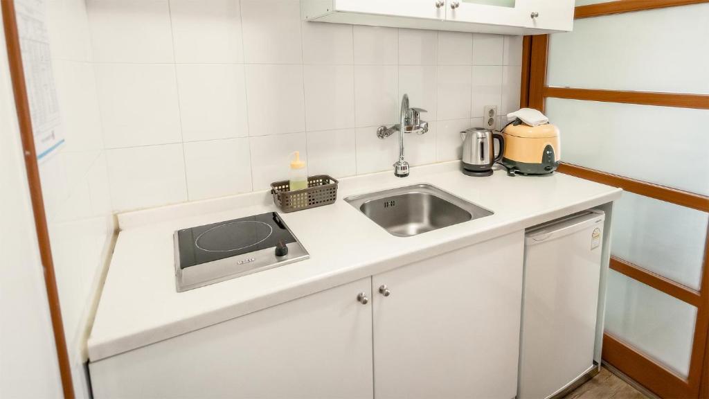 Kuchyň nebo kuchyňský kout v ubytování Dawoo Resortel