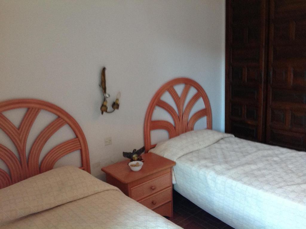 Postel nebo postele na pokoji v ubytování Apartament Turístic Alhambra