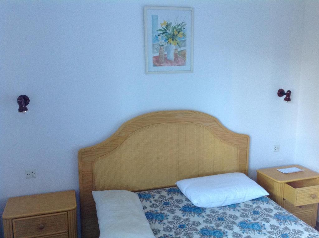 Postel nebo postele na pokoji v ubytování Apartament Turístic Alhambra