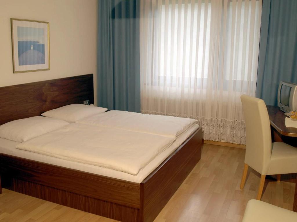 Postel nebo postele na pokoji v ubytování Winzerhof Michael Gartner