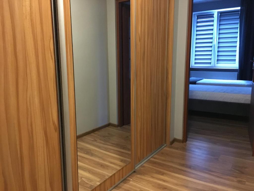 Posteľ alebo postele v izbe v ubytovaní Apartament Elbląg Centrum