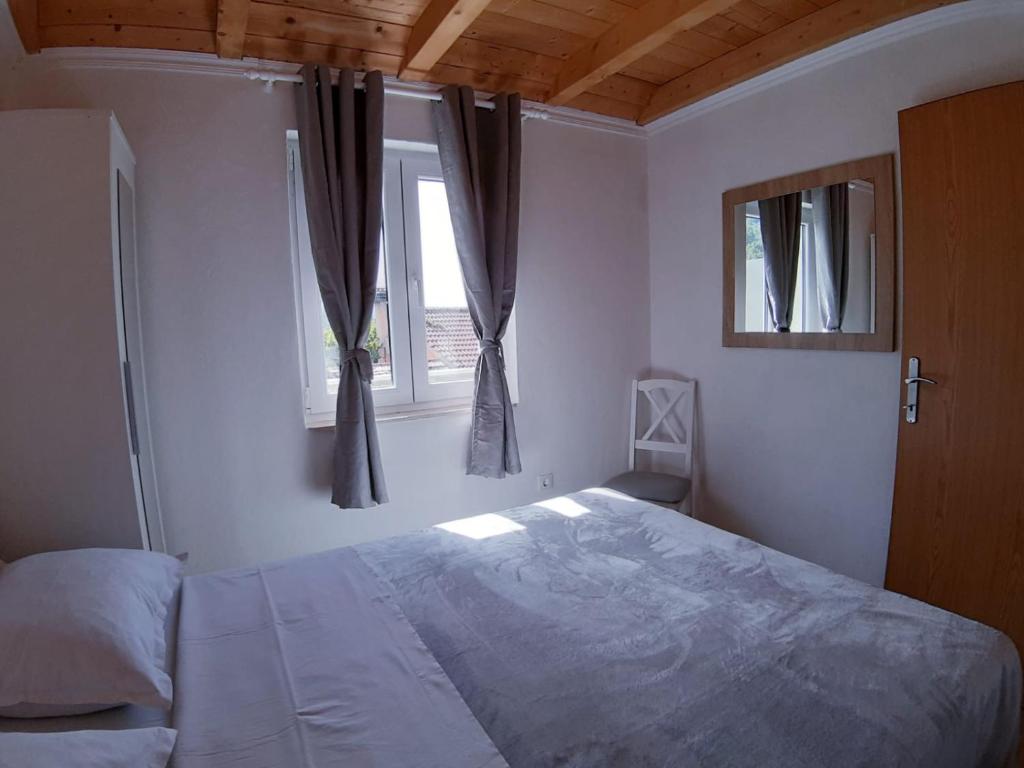 Postel nebo postele na pokoji v ubytování Kuća za odmor Dobrila