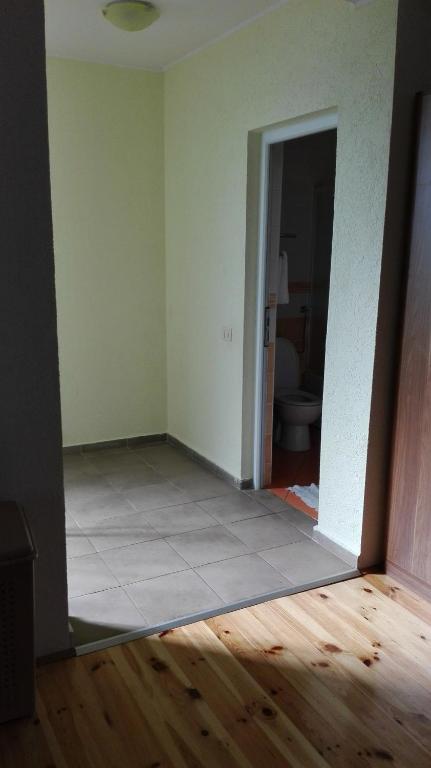 Postel nebo postele na pokoji v ubytování Villa Nadija