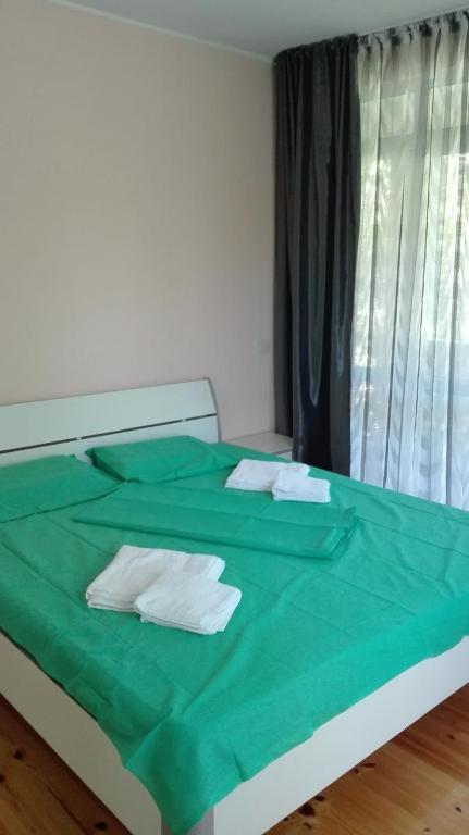Postel nebo postele na pokoji v ubytování Villa Nadija