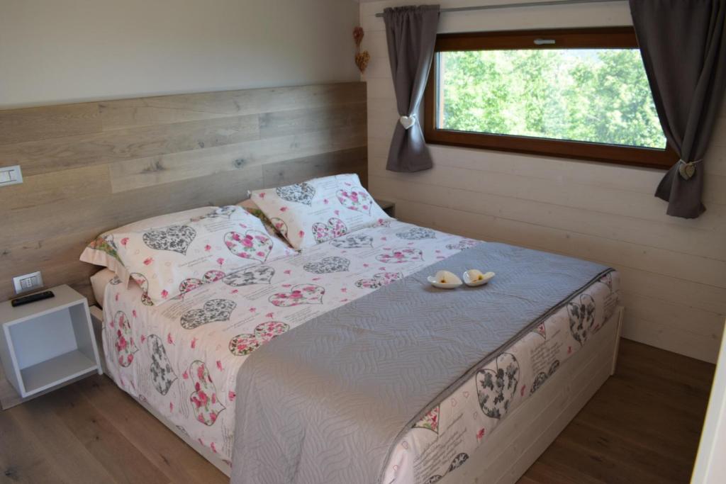 Postel nebo postele na pokoji v ubytování 2 CUORI E UN B&B