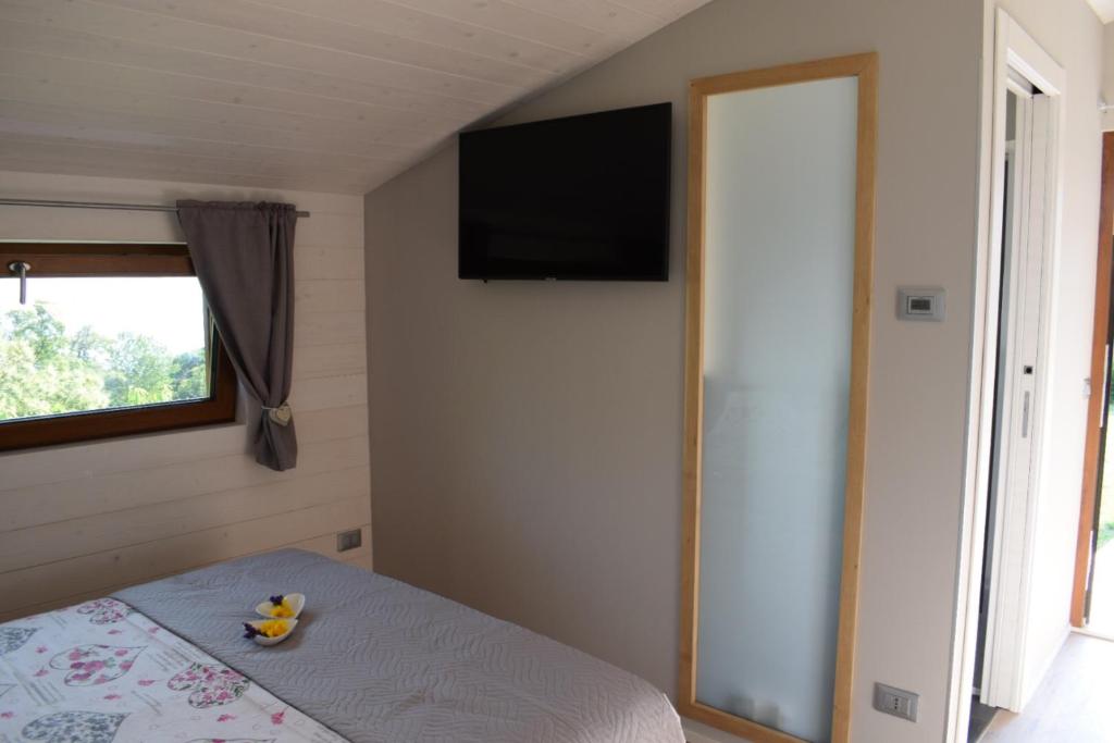 Postel nebo postele na pokoji v ubytování 2 CUORI E UN B&B