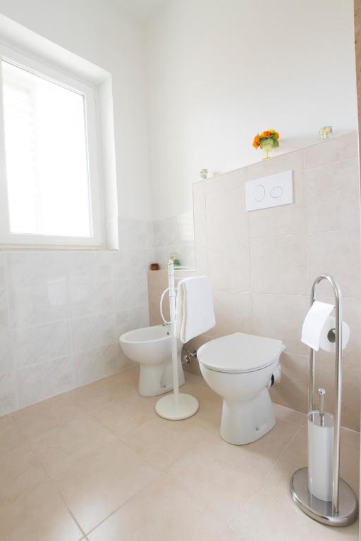 Koupelna v ubytování Le Maschere B&B