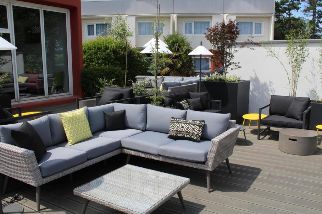 Posezení v ubytování Golden Tulip Roissy Saint Witz