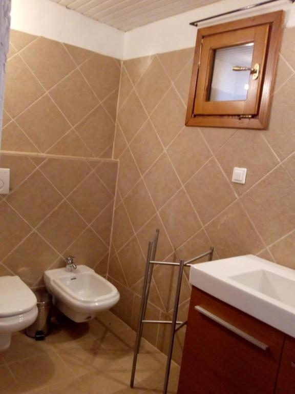 Koupelna v ubytování Villa Glaykos