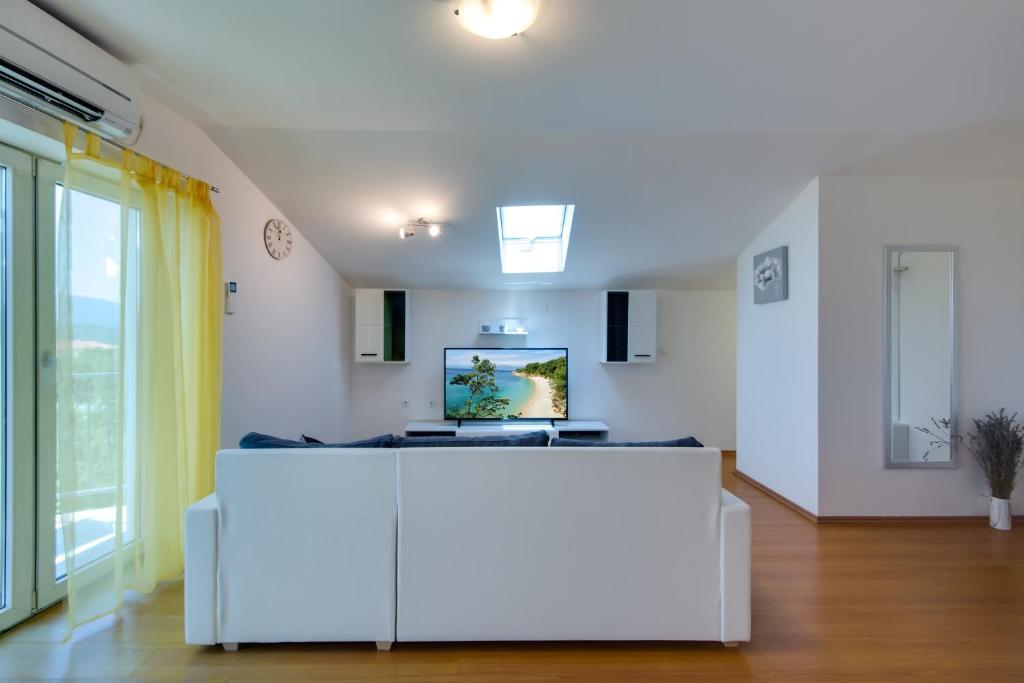 Kuchyň nebo kuchyňský kout v ubytování Apartmani Admiral