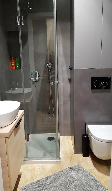 Kúpeľňa v ubytovaní Studio Centrum Pawia Deluxe- w studiu wentylator-fan