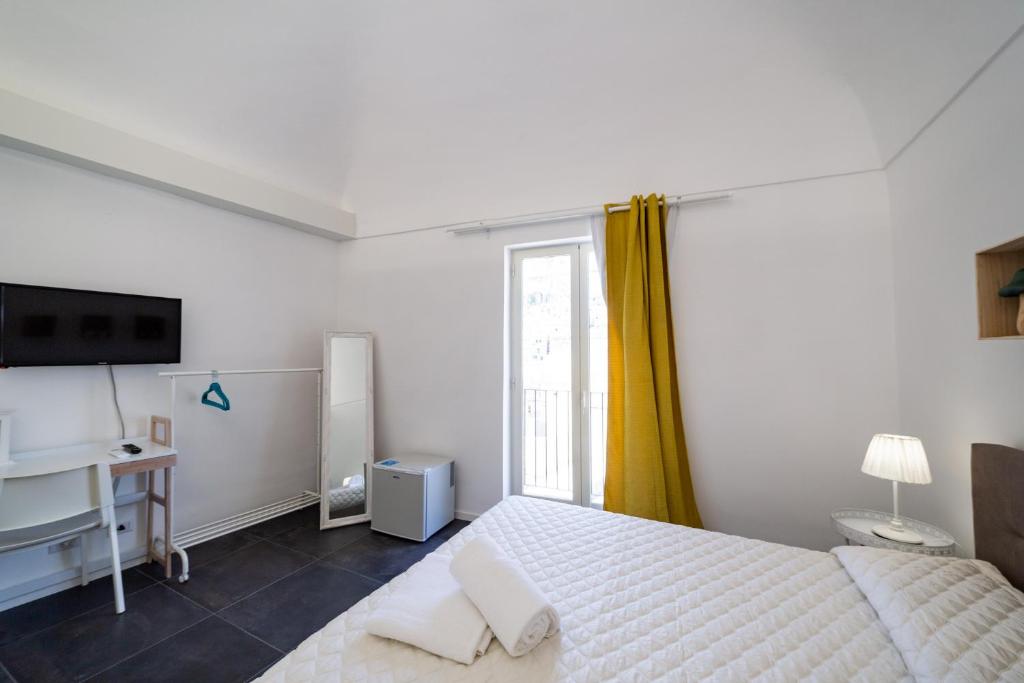 Posteľ alebo postele v izbe v ubytovaní A casa di Cassi