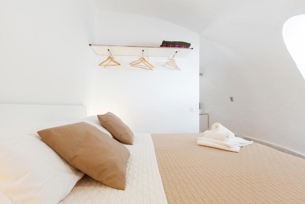 Posteľ alebo postele v izbe v ubytovaní Residence Guidaloca