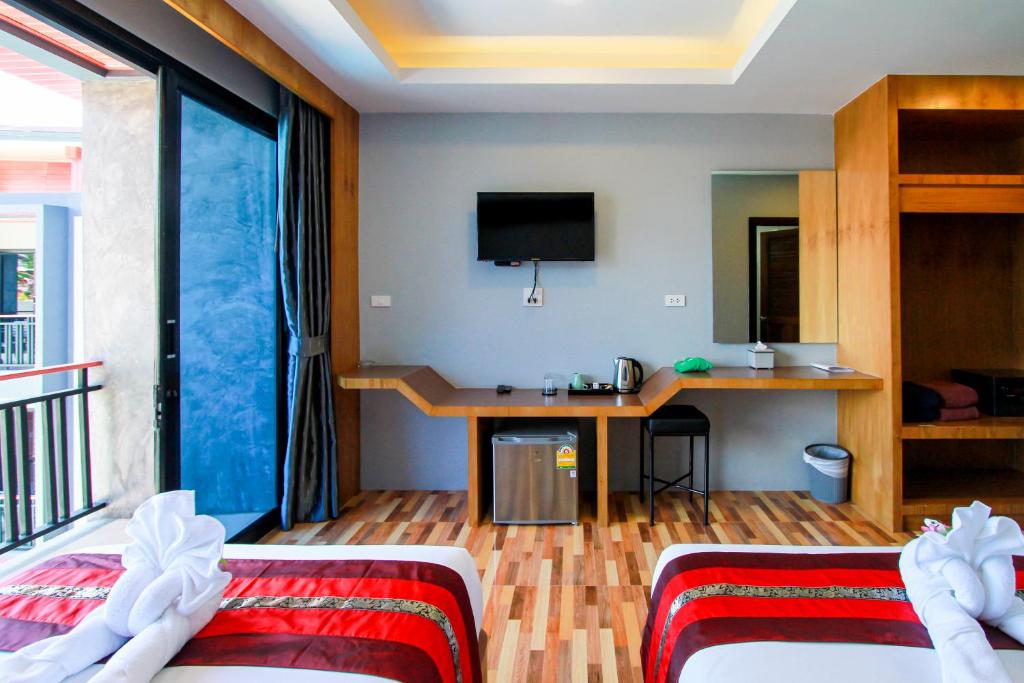 Postel nebo postele na pokoji v ubytování Coco Bella Hotel