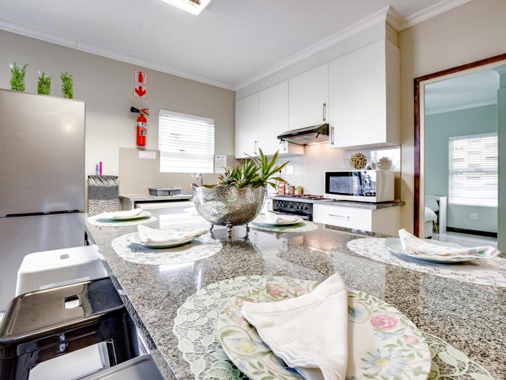 Η κουζίνα ή μικρή κουζίνα στο Westwood Skye 12 Grace Avenue
