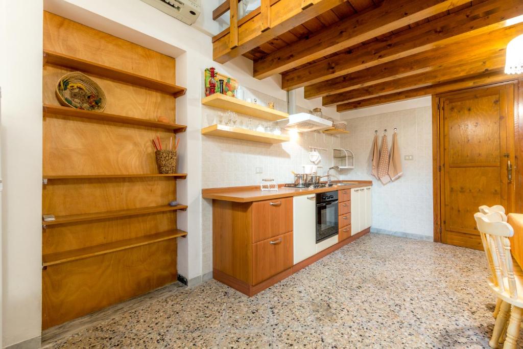 Kuchyň nebo kuchyňský kout v ubytování Palazzo Refolo
