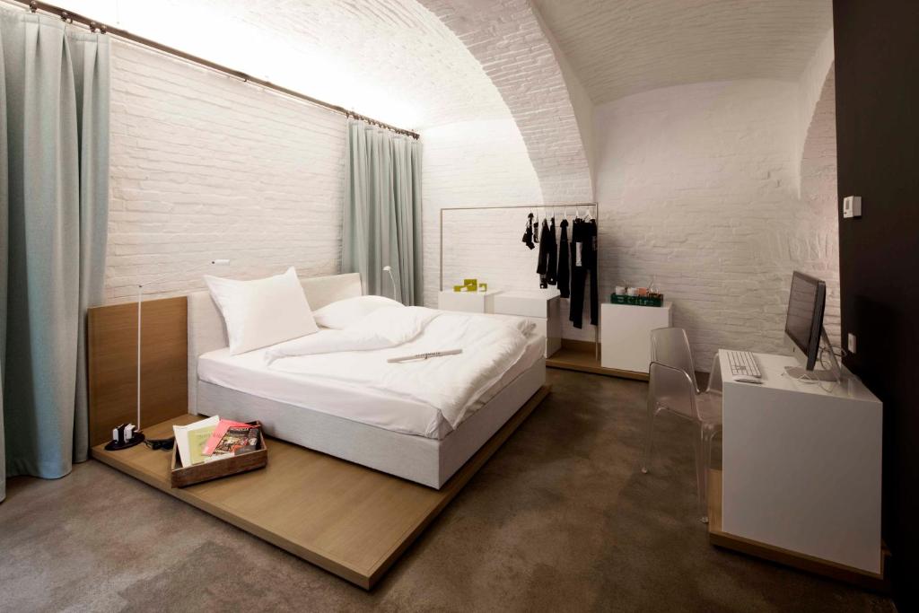 Postel nebo postele na pokoji v ubytování grätzlhotel beim Belvedere