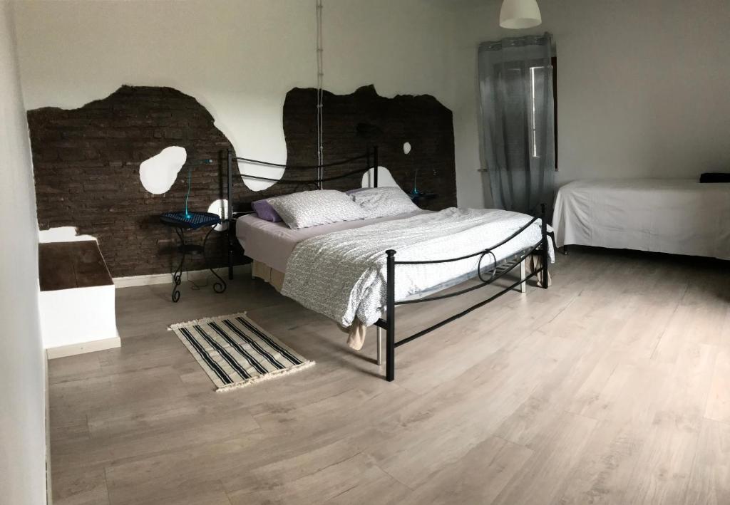 Postel nebo postele na pokoji v ubytování La Torretta