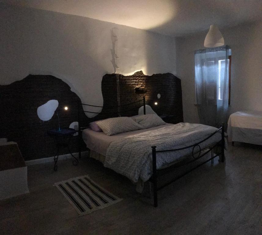 Postel nebo postele na pokoji v ubytování La Torretta